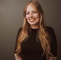 Portrait of Tia Clarke, Real Estate Consultant